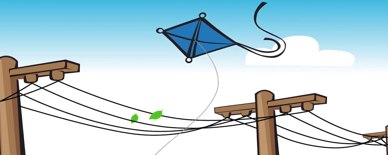 flying kite next to a downed power line